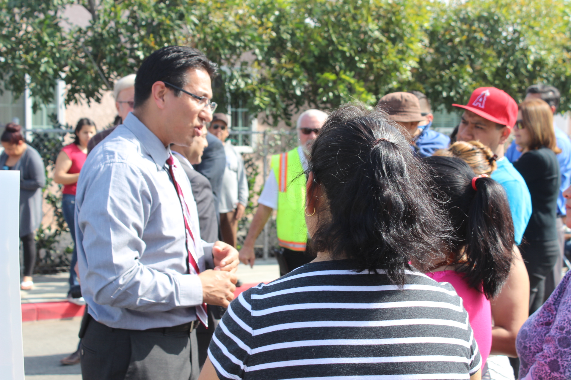 Mayor Miguel Canales speaks with residents about the improvements.